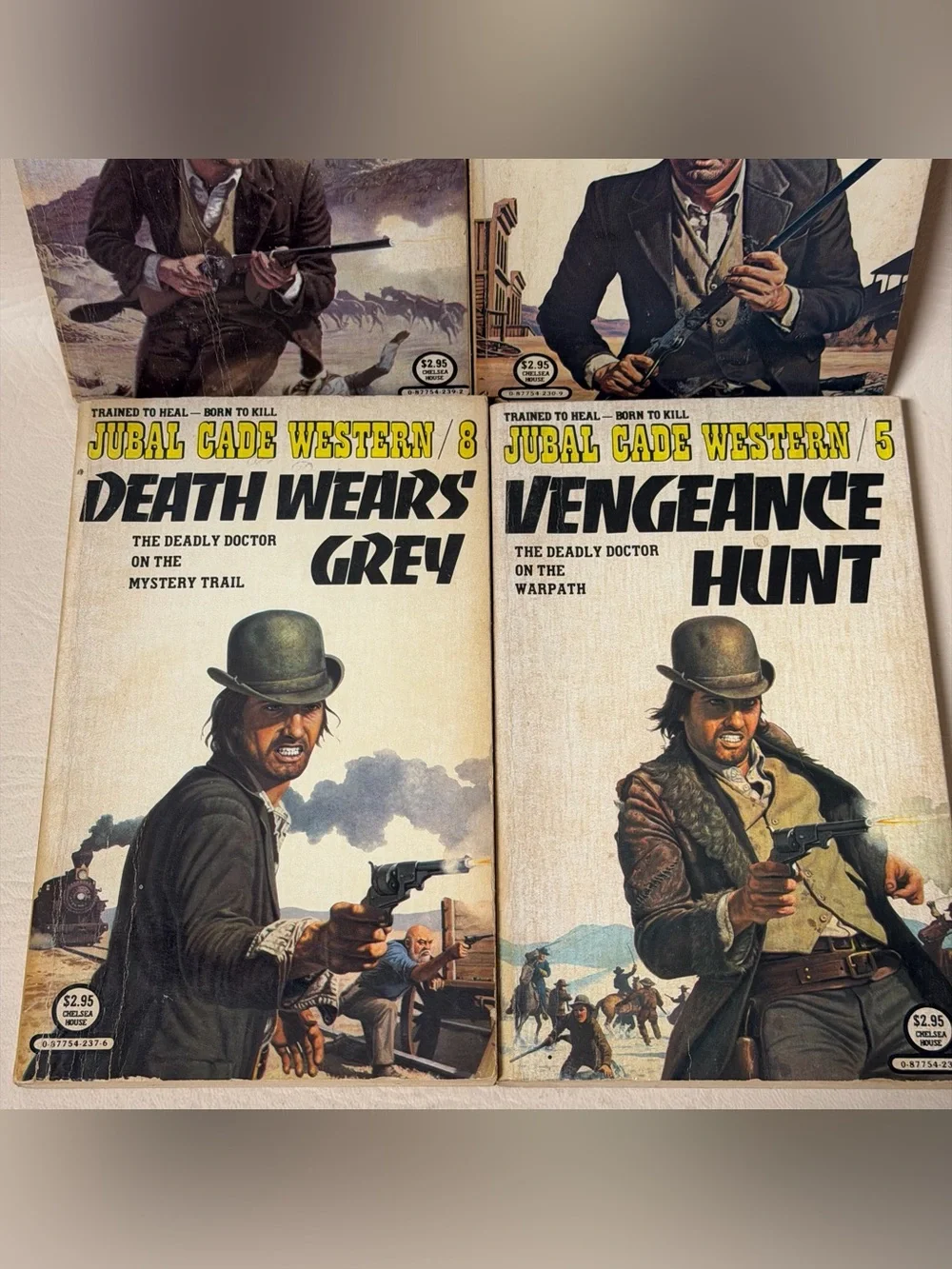 Vintage set of (4 ) JUBAL CADE WESTERNS Paperback Books